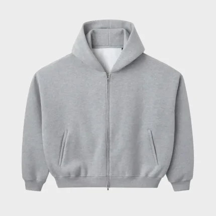 Grey blank zip‑up hoodie with hood, long sleeves, front zipper, and front pockets on a white background
